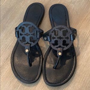 Tory Burch - black leather flip flops